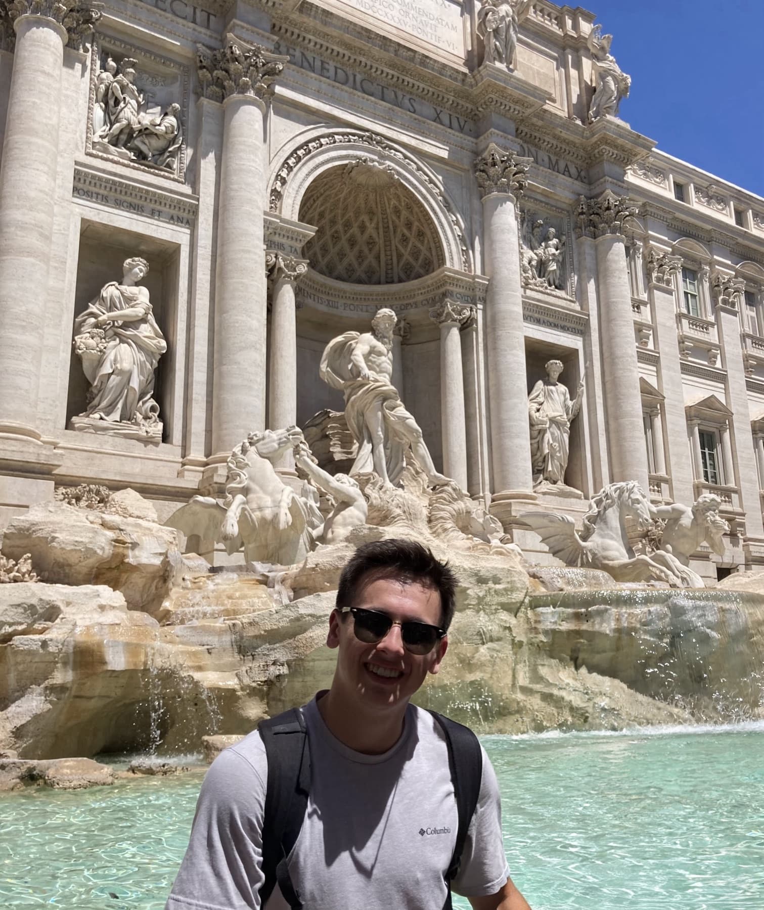 Dominic Rosato in front of the Trevi Fountain in Rome