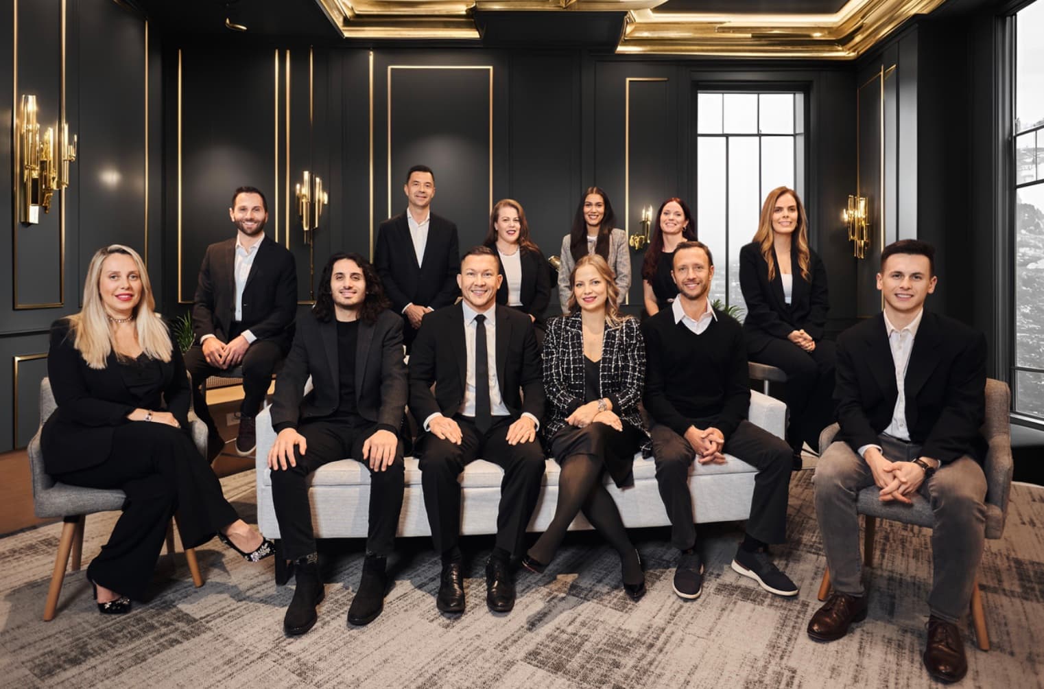 The VIP Team at Compass, twelve agents photographed together